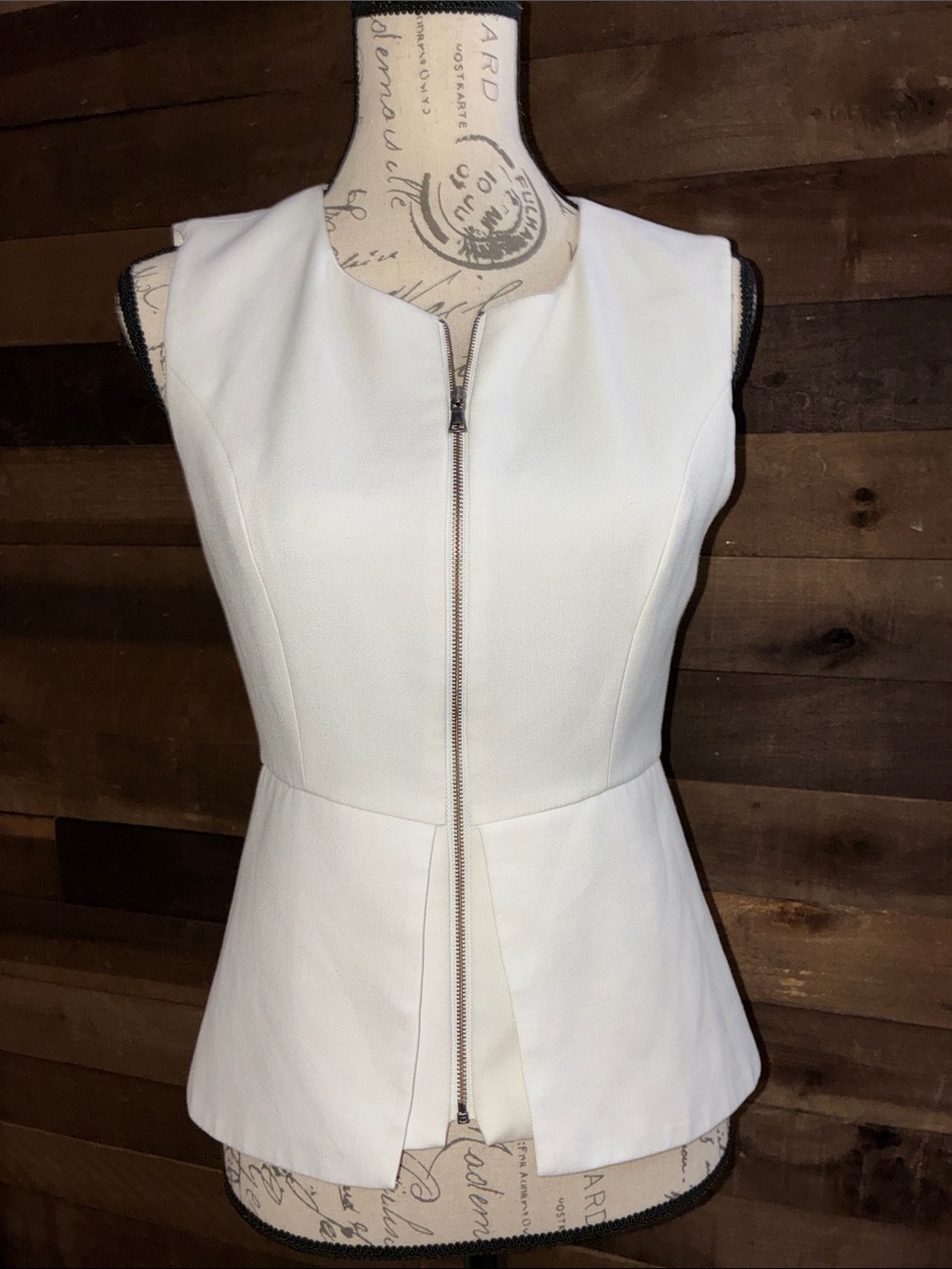 BCBGMaxAzria White Sleeveless Zip-Front Peplum Top